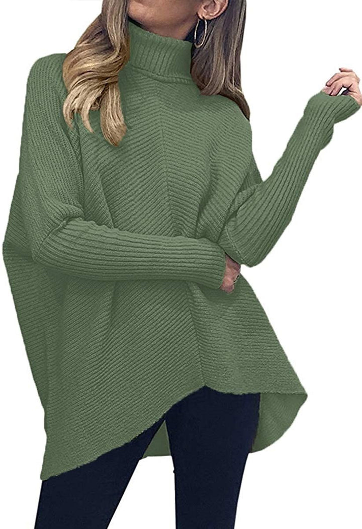 Damernas oversized stickad tröja med hög krage och strukturerad design Mirla-Eva Jonsson