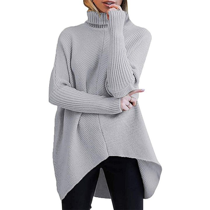 Damernas oversized stickad tröja med hög krage och strukturerad design Mirla-Eva Jonsson