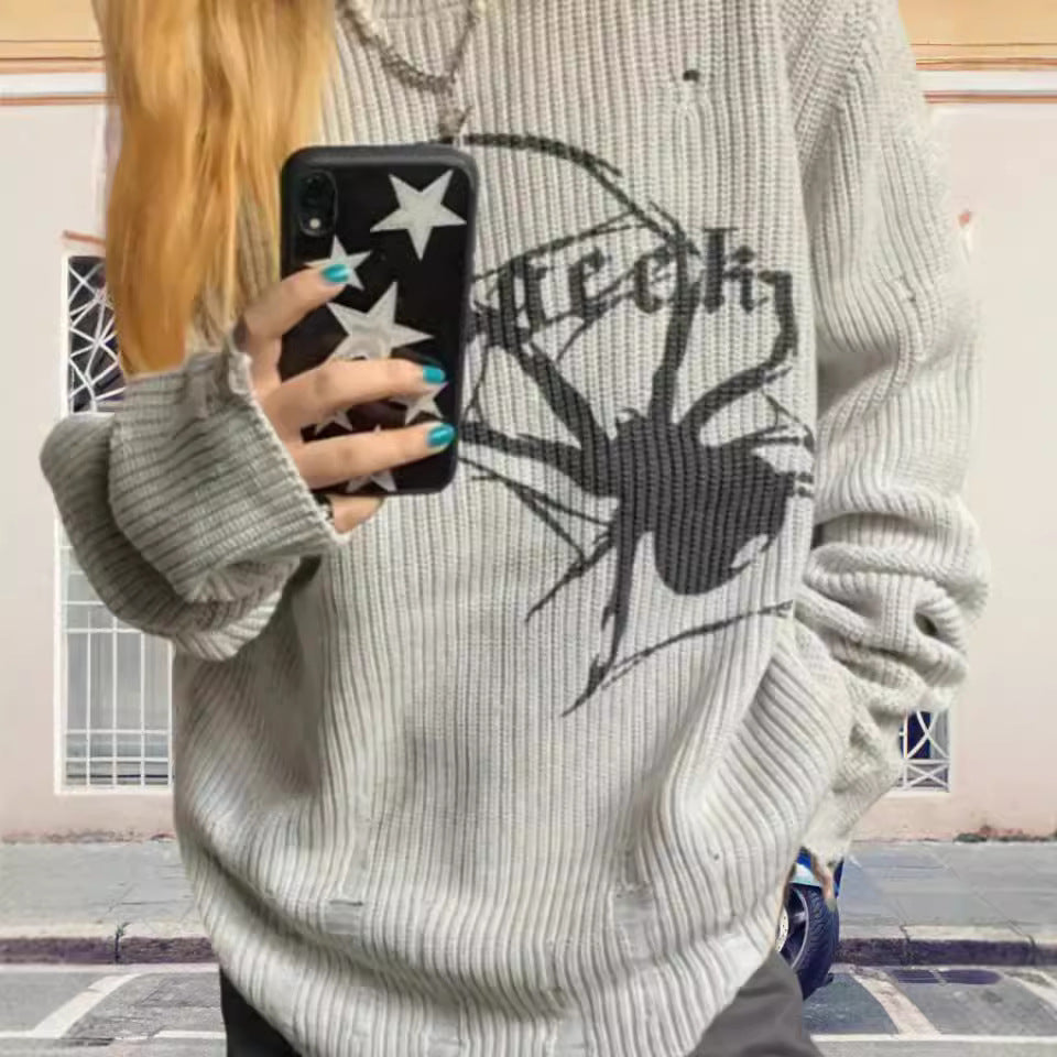 Damernas oversized stickad tröja med iögonfallande spindelmönster Eva Jonsson-Eva Jonsson