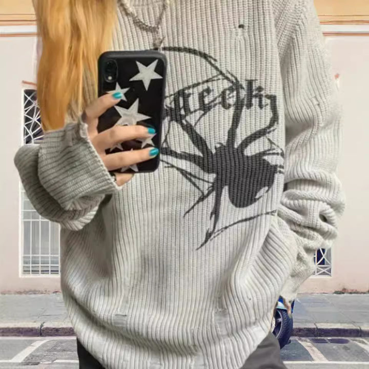 Damernas oversized stickad tröja med iögonfallande spindelmönster Eva Jonsson-Eva Jonsson