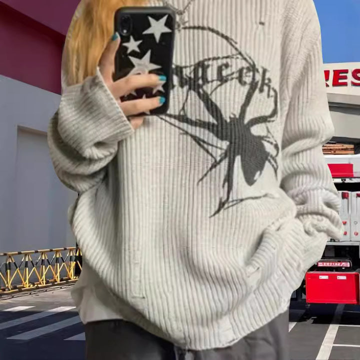 Damernas oversized stickad tröja med iögonfallande spindelmönster Eva Jonsson-Eva Jonsson