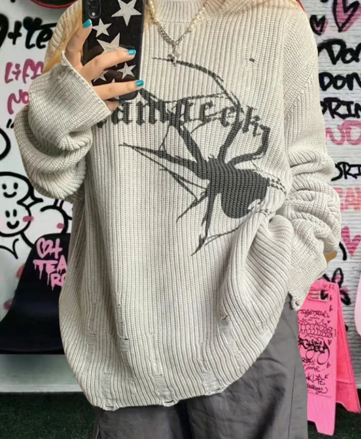 Damernas oversized stickad tröja med iögonfallande spindelmönster Eva Jonsson-Eva Jonsson
