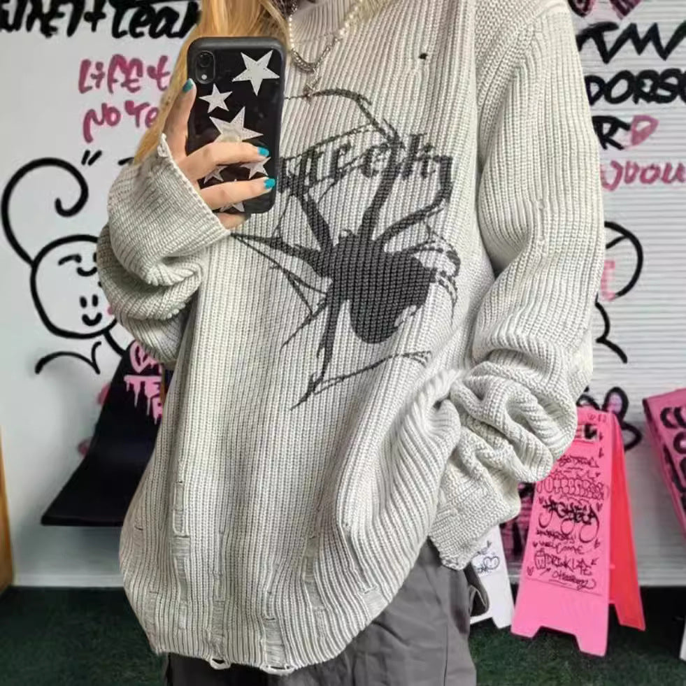 Damernas oversized stickad tröja med iögonfallande spindelmönster Eva Jonsson-Eva Jonsson