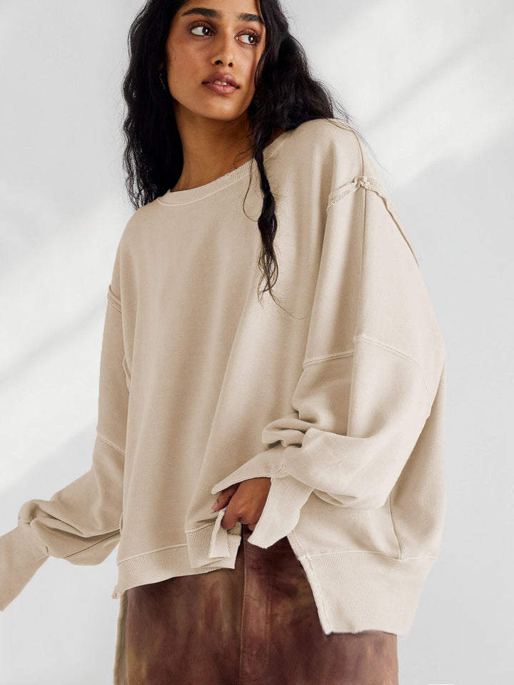 Damernas oversized sweatshirt i avslappnad stil med iögonfallande puffärmar Mirla-Eva Jonsson
