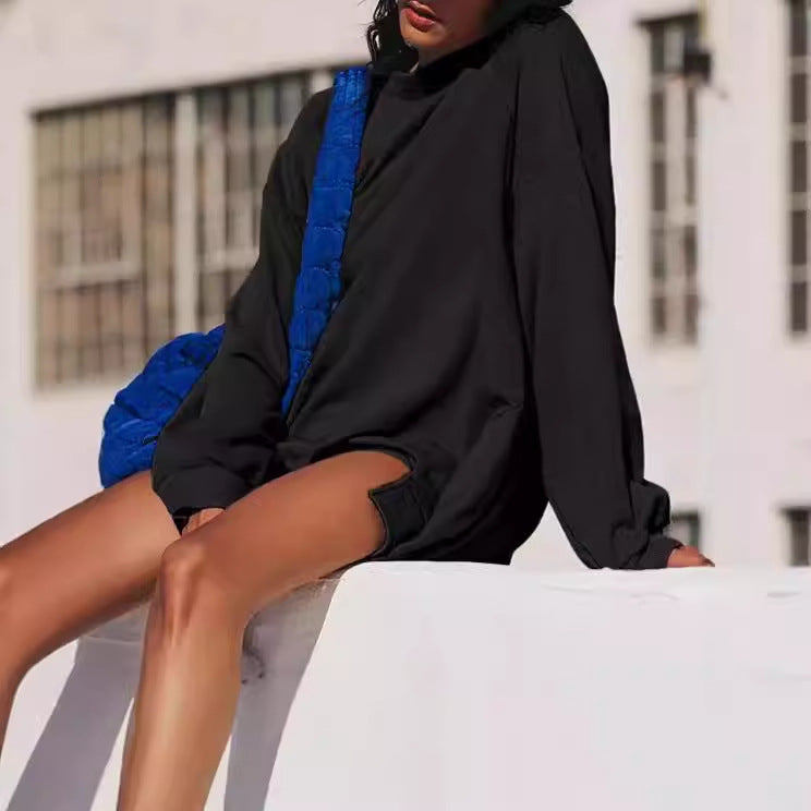 Damernas oversized sweatshirt med avslappnad passform och praktiska fickor Mirla-Eva Jonsson