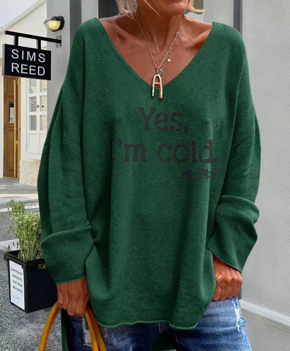 Damernas oversized tröja med modern V-ringning och tryckt uttalande Mirla-Eva Jonsson