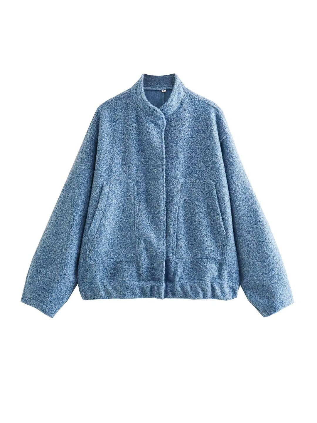 Damernas oversized vinterjacka med hög krage och praktiska fickor Mirla-Eva Jonsson