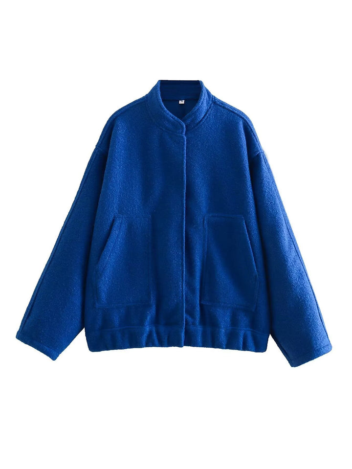 Damernas oversized vinterjacka med hög krage och praktiska fickor Mirla-Eva Jonsson