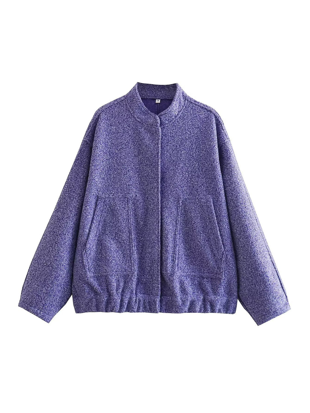 Damernas oversized vinterjacka med hög krage och praktiska fickor Mirla-Eva Jonsson