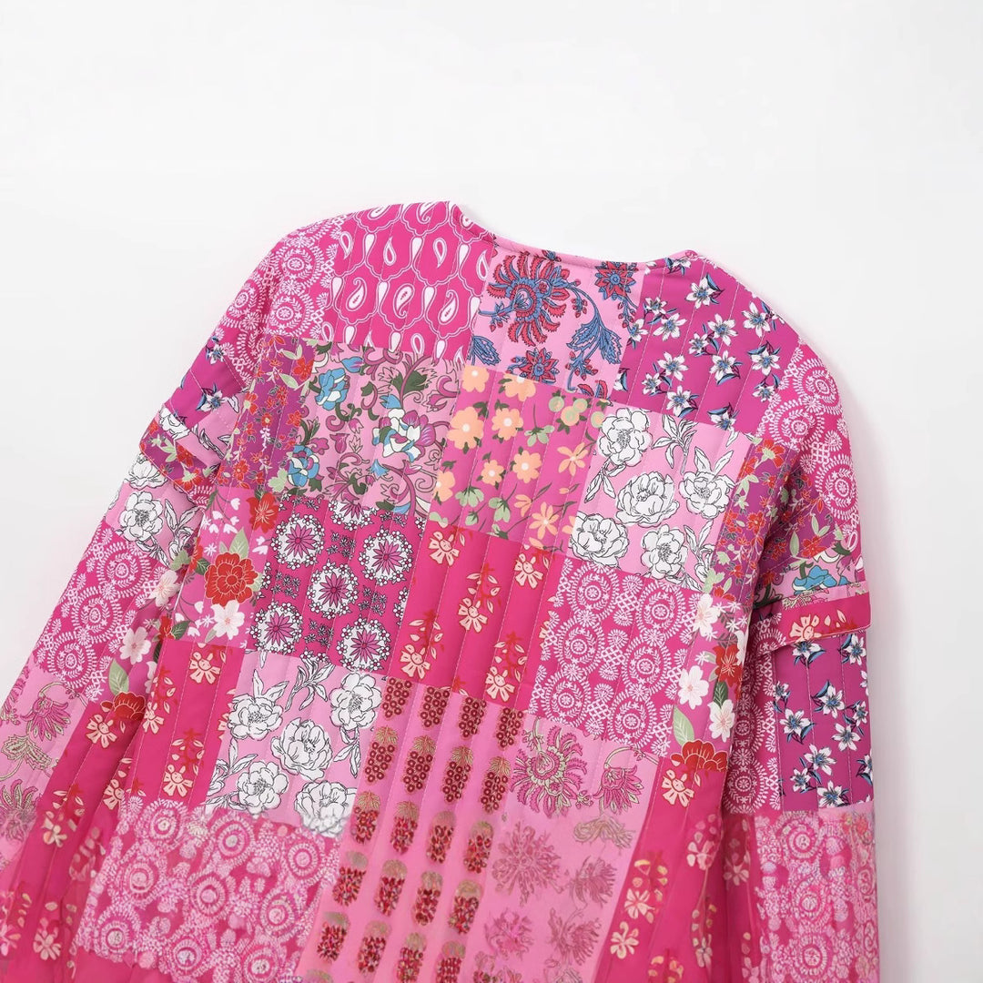 Damernas patchworkjacka med florala motiv och praktiska fickor Mirla-Eva Jonsson