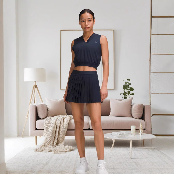 Damernas plisserad kjol med hög midja och sportig design Mirla-Eva Jonsson