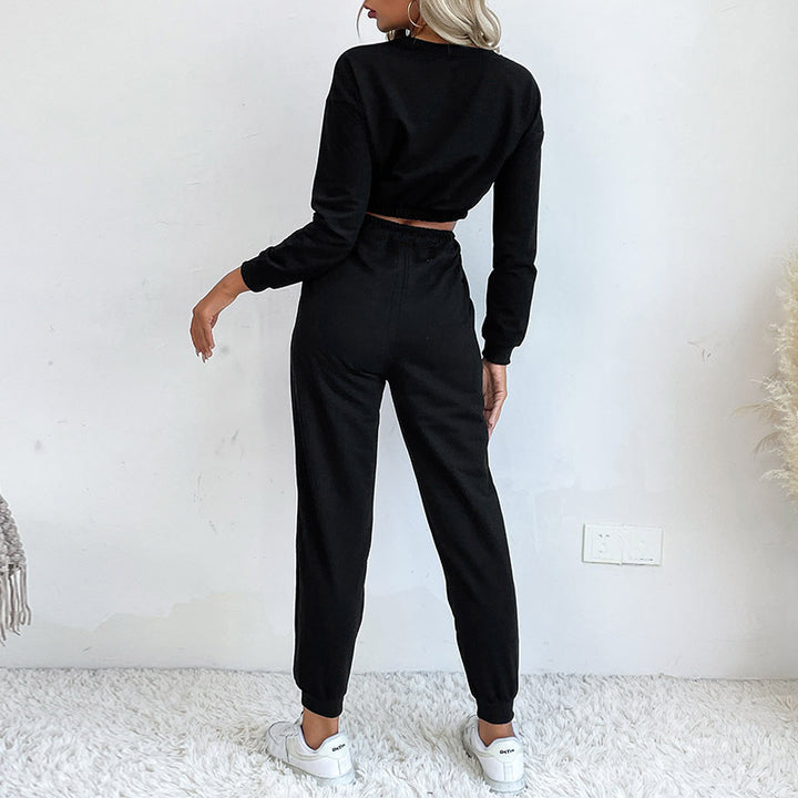 Damernas praktiska jumpsuit med elastisk midja och smickrande knutdetalj Mirla-Eva Jonsson