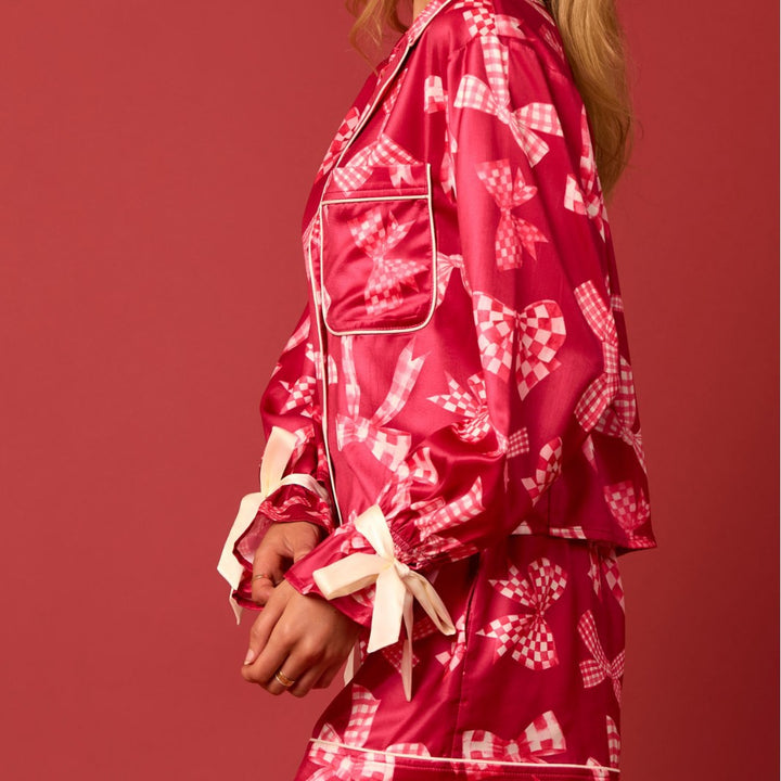 Damernas pyjamas-set med festligt julmotiv och eleganta volangdetaljer Eva Jonsson-Eva Jonsson
