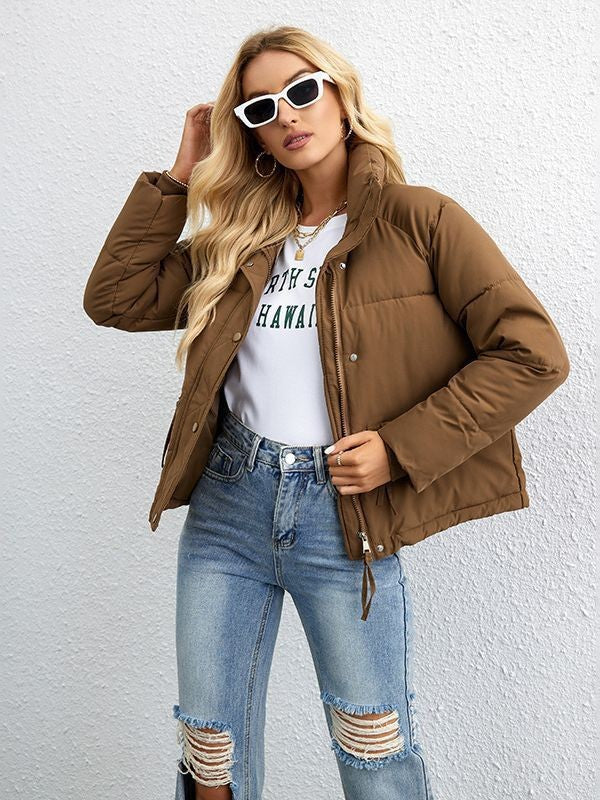 Damernas quiltad övergångsjacka med huva och moderna fickor Mirla-Eva Jonsson