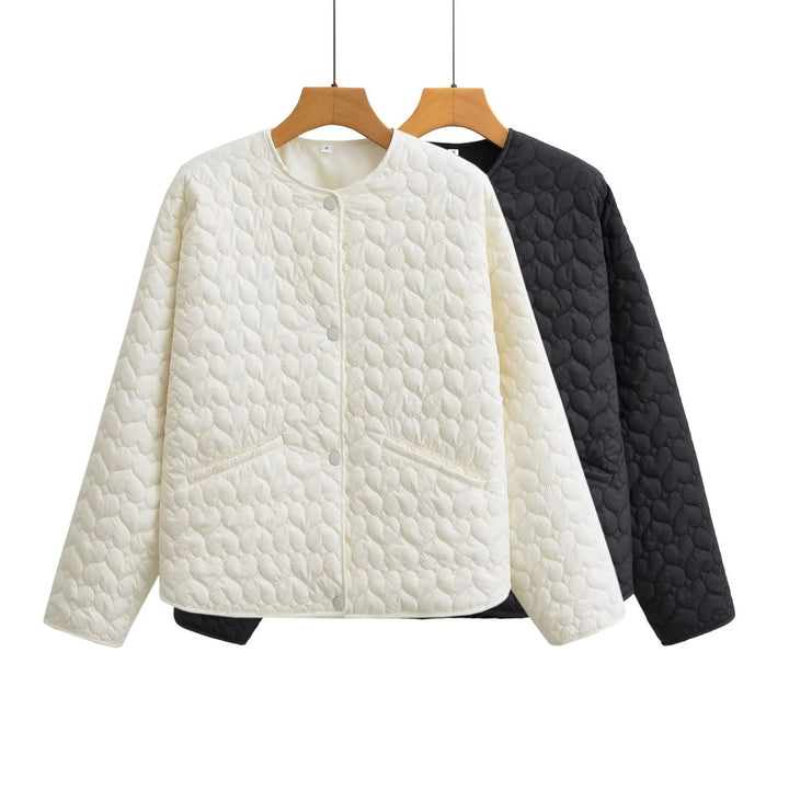 Damernas quiltad övergångsjacka med sidfickor och modern design Mirla-Eva Jonsson