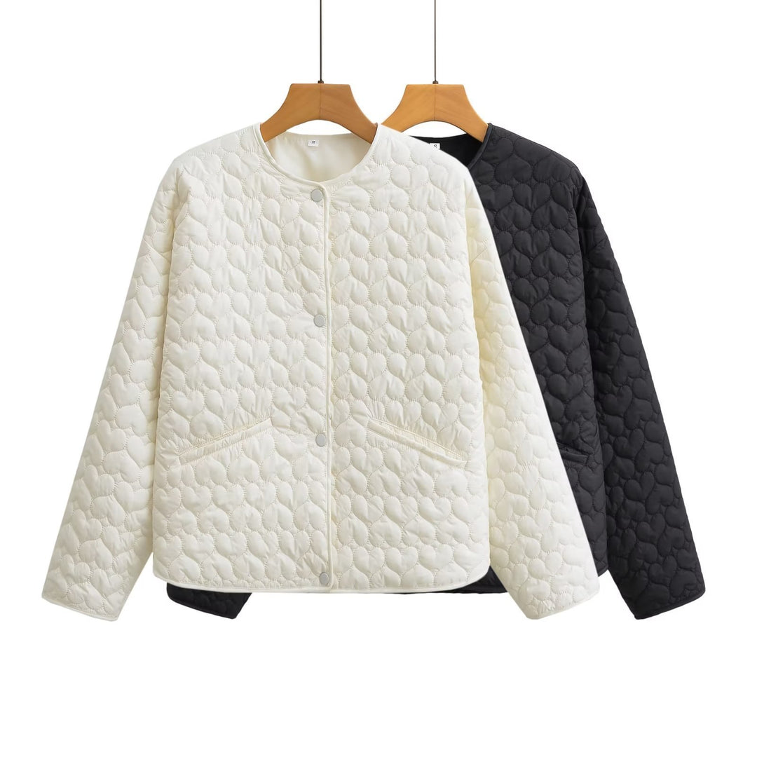Damernas quiltad övergångsjacka med sidfickor och modern design Mirla-Eva Jonsson