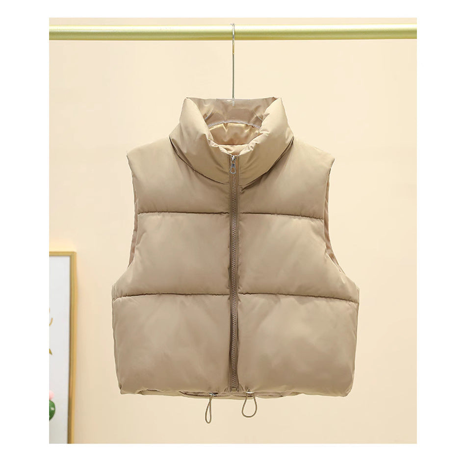 Damernas quiltad väst med hög krage och justerbar midja Mirla-Eva Jonsson