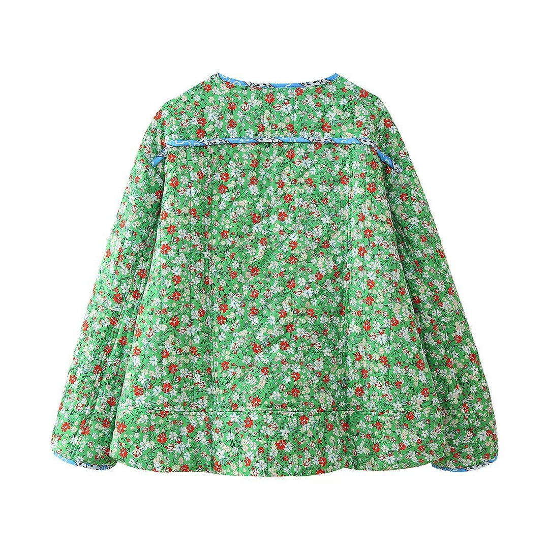Damernas quiltade blommjacka med praktiska fickor och elegant krage Mirla-Eva Jonsson