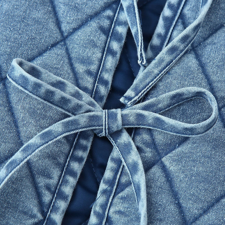 Damernas quiltade utility-jacka med elegant krage och volangdetaljer Mirla-Eva Jonsson
