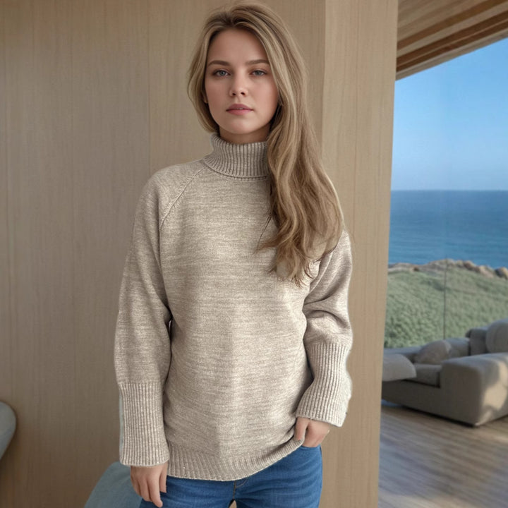 Damernas rullkragepullover med strukturerad design och glittrande detaljer Eva Jonsson-Eva Jonsson