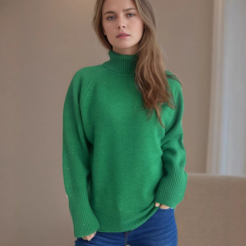 Damernas rullkragepullover med strukturerad design och glittrande detaljer Eva Jonsson-Eva Jonsson