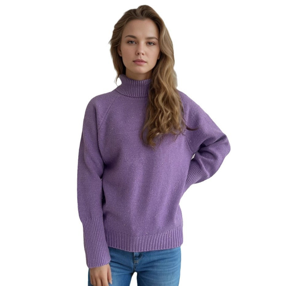 Damernas rullkragepullover med strukturerad design och glittrande detaljer Eva Jonsson-Eva Jonsson