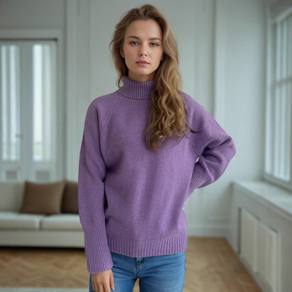 Damernas rullkragepullover med strukturerad design och glittrande detaljer Eva Jonsson-Eva Jonsson
