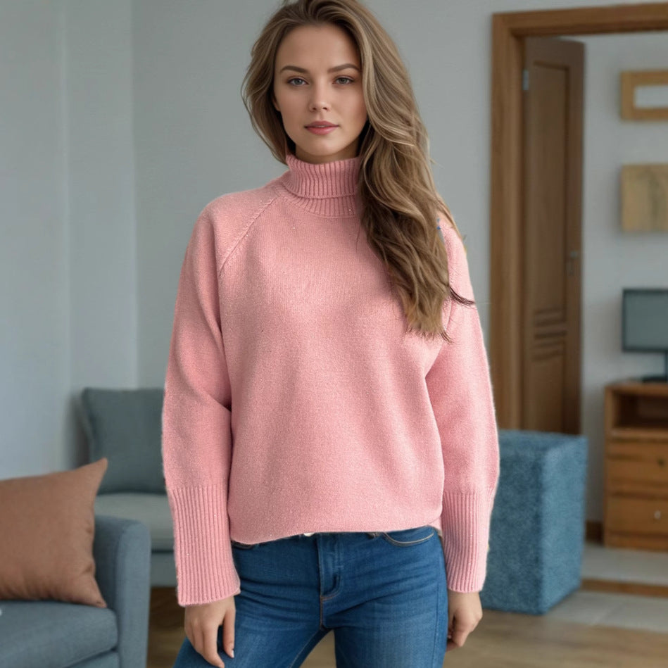 Damernas rullkragepullover med strukturerad design och glittrande detaljer Eva Jonsson-Eva Jonsson