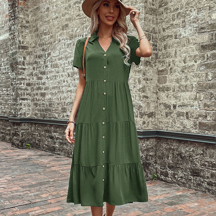 Damernas skjortklänning med eleganta knapppdetaljer och voluminös kjol Mirla-Eva Jonsson