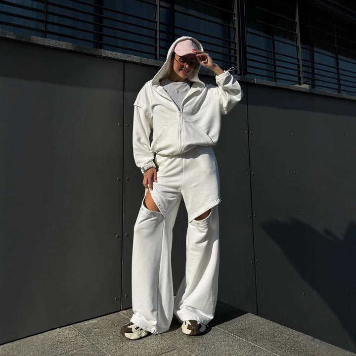 Damernas sportiga set med huva stödja hoodie och fransiga byxor Mirla-Eva Jonsson