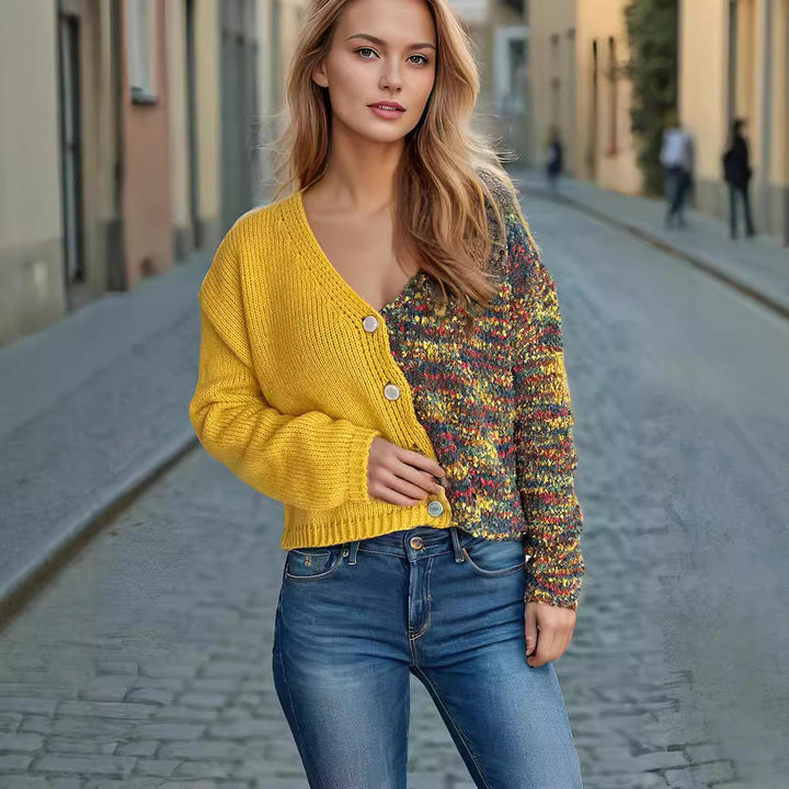 Damernas stiliga kofta med långa puffärmar och färgglad accent Mirla-Eva Jonsson