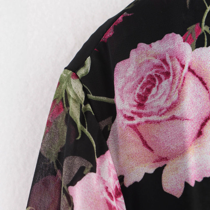 Damernas transparenta blusklänning med blommönster och V-ringning Mirla-Eva Jonsson