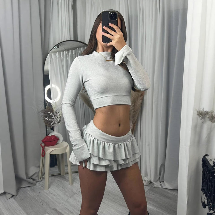 Damernas trendiga crop top och plisserad mini kjol set Mirla-Eva Jonsson