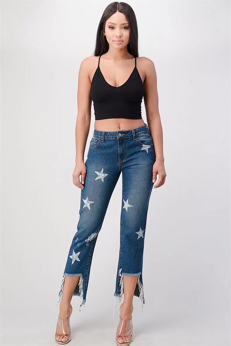 Damernas trendiga jeans med stjärnmönster och fransig fåll Mirla-Eva Jonsson