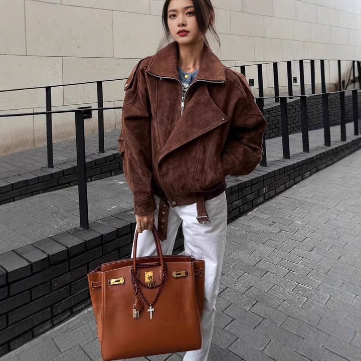 Damernas trendiga oversized läderjacka med bälte Mirla-Eva Jonsson