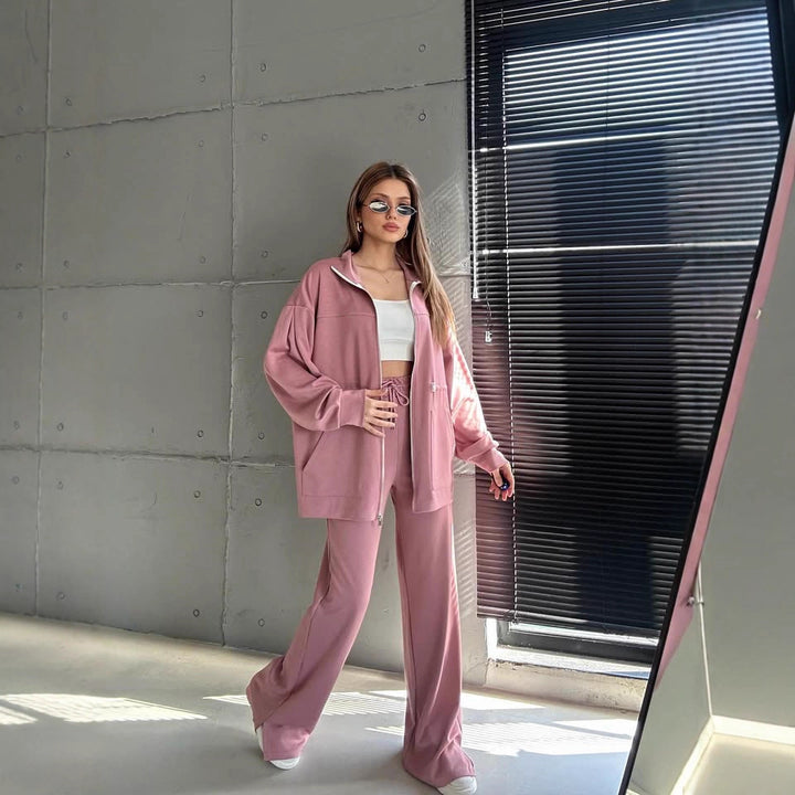 Damernas trendiga satin sportset med justerbar midja och hög krage Mirla-Eva Jonsson