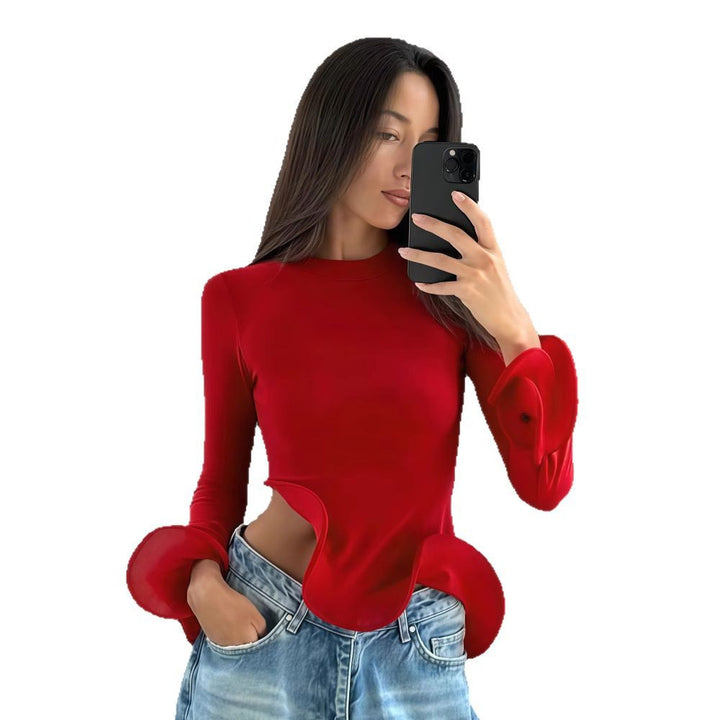 Damernas trendiga topp med asymmetriska volangdetaljer och elegant design Mirla-Eva Jonsson