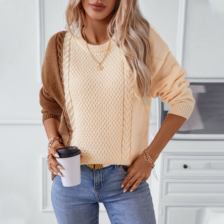 Damernas trendiga tröja med strukturerad flätmönster och innovativt färgblockdesign Mirla-Eva Jonsson