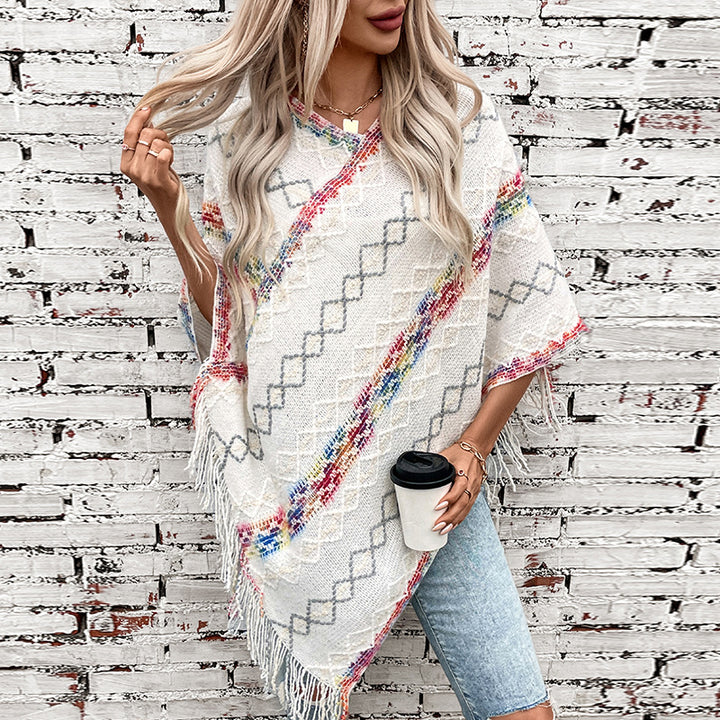 Damernas trendiga wraptröja med fransig fåll och unikt mönster Mirla-Eva Jonsson