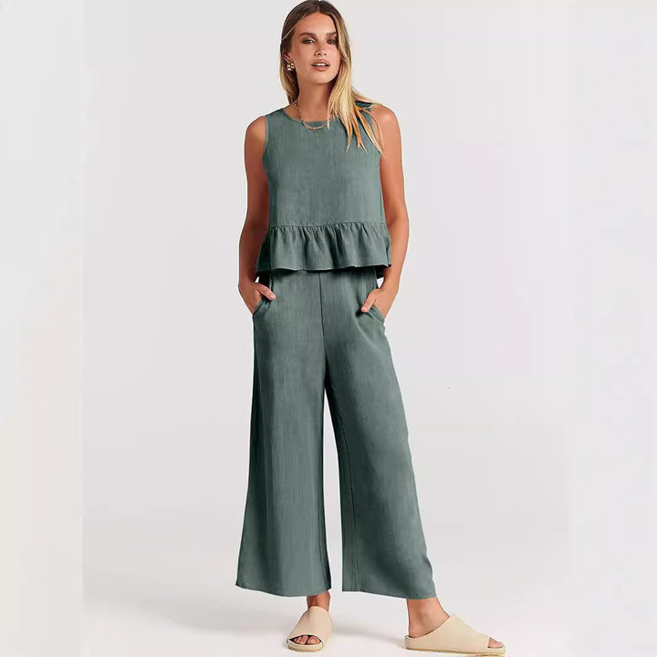 Damernas tvådelade set med snygg peplum-topp och vida byxor Mirla-Eva Jonsson
