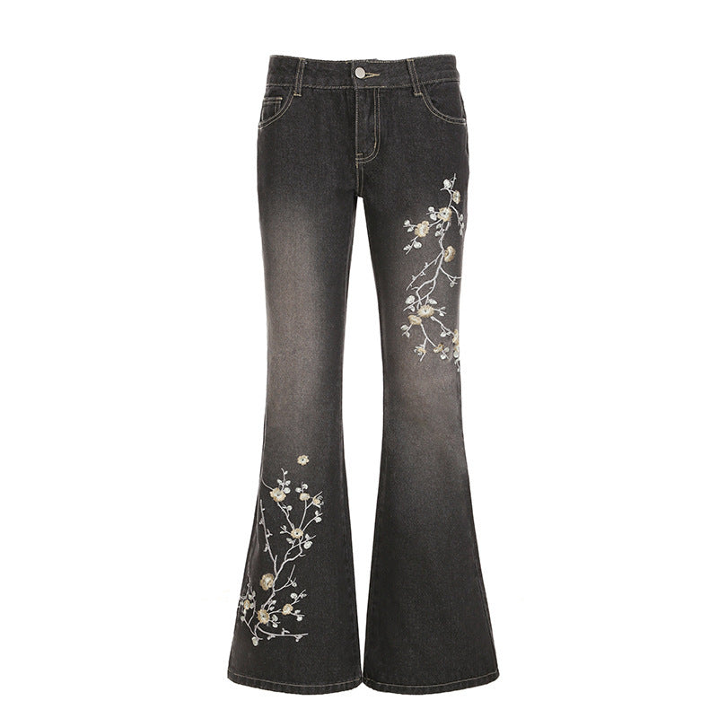 Damernas utsvängda jeans med blommig broderidesign och hög midja Mirla-Eva Jonsson