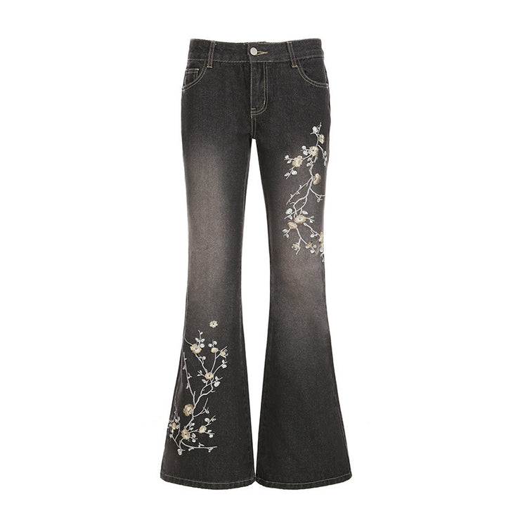 Damernas utsvängda jeans med blommig broderidesign och hög midja Mirla-Eva Jonsson