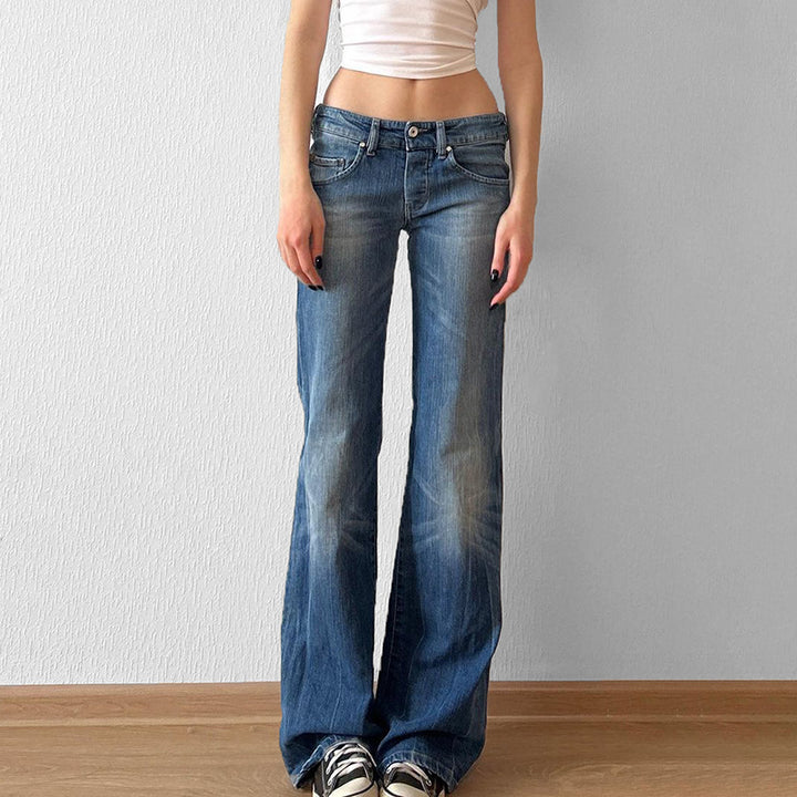 Damernas utsvängda jeans med hög midja och distressed design Mirla-Eva Jonsson