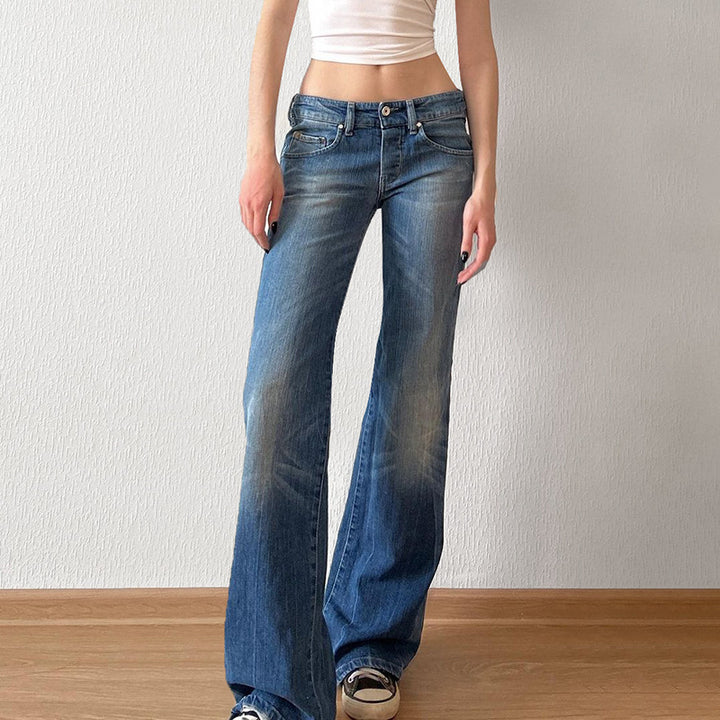 Damernas utsvängda jeans med hög midja och distressed design Mirla-Eva Jonsson