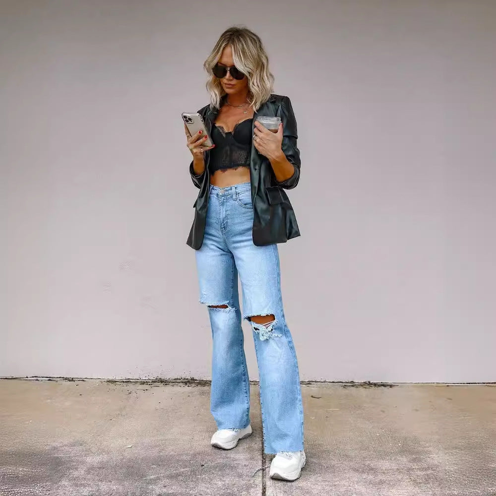 Damernas utsvängda jeans med moderna förstörda detaljer Mirla-Eva Jonsson