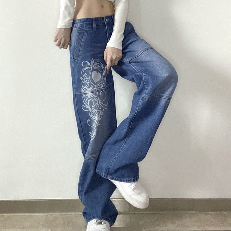 Damernas vida denim-byxor med konstnärligt tryck Mirla-Eva Jonsson