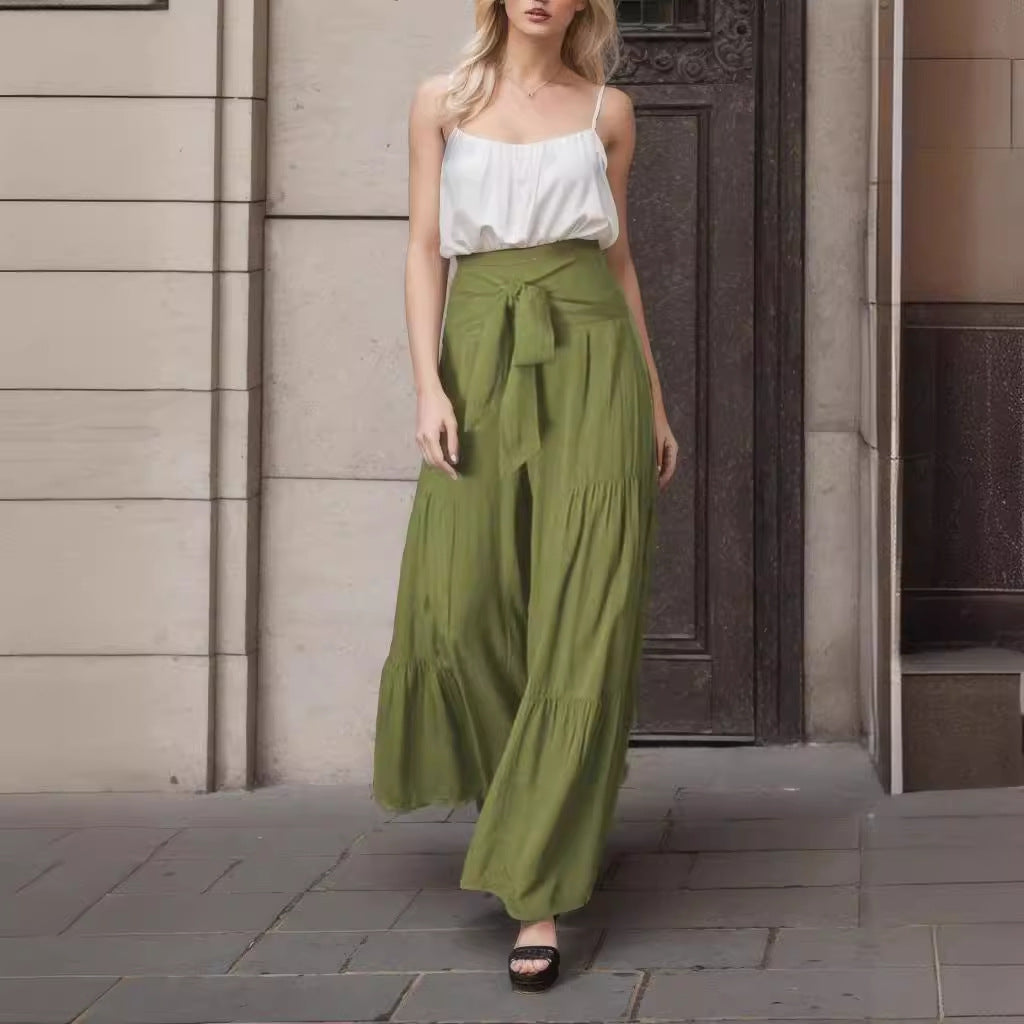 Damernas vida högmidjade byxor med eleganta veck och knytbälte Mirla-Eva Jonsson
