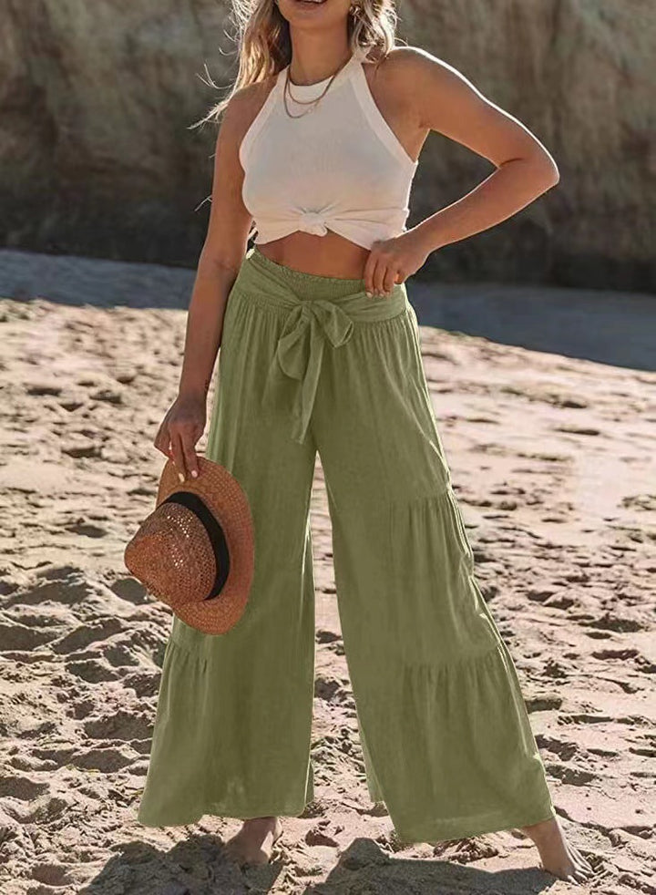 Damernas vida strandbyxor med voluminösa volanger och knytbälte Mirla-Eva Jonsson