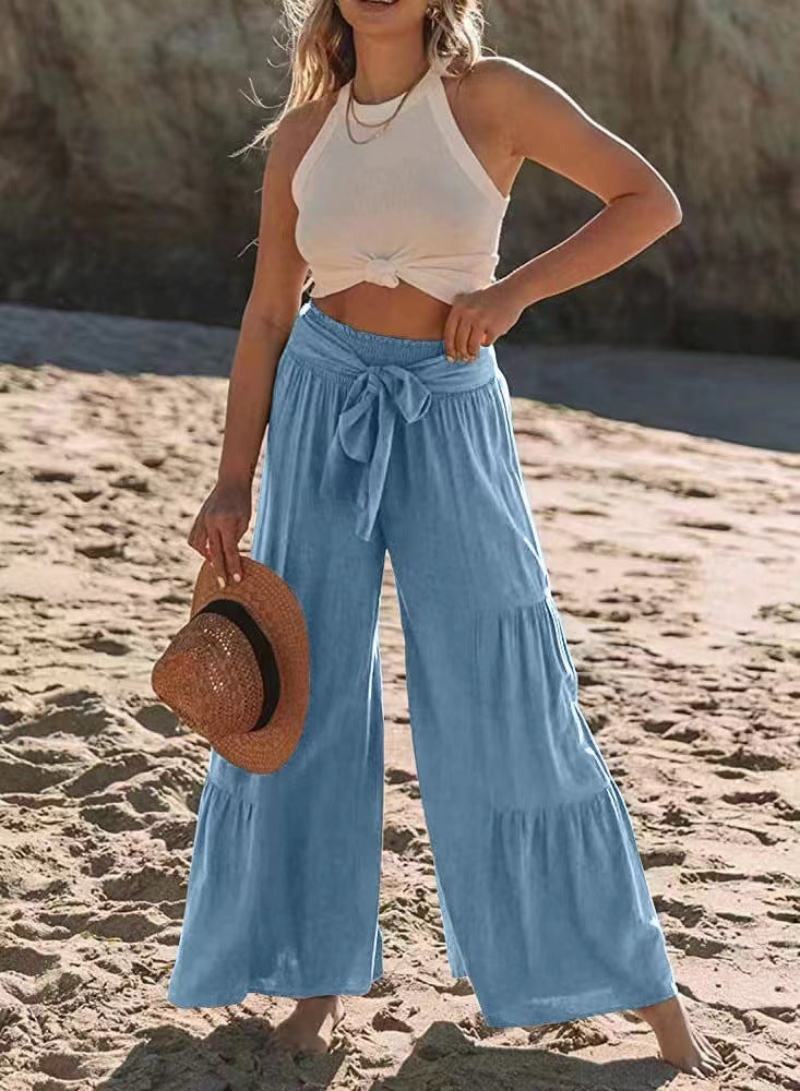 Damernas vida strandbyxor med voluminösa volanger och knytbälte Mirla-Eva Jonsson