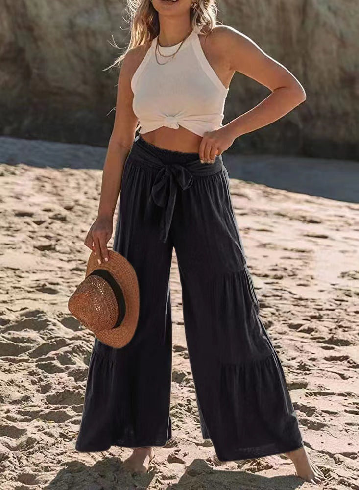 Damernas vida strandbyxor med voluminösa volanger och knytbälte Mirla-Eva Jonsson